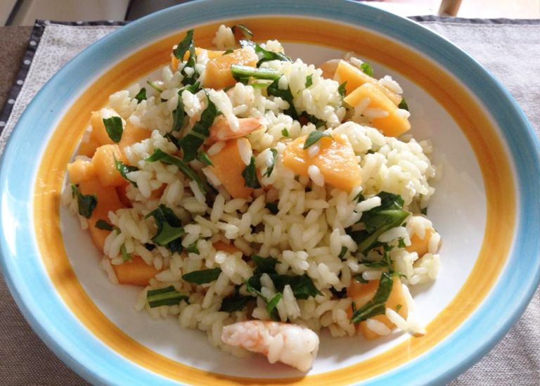 Risotto con gamberetti melone e rucola