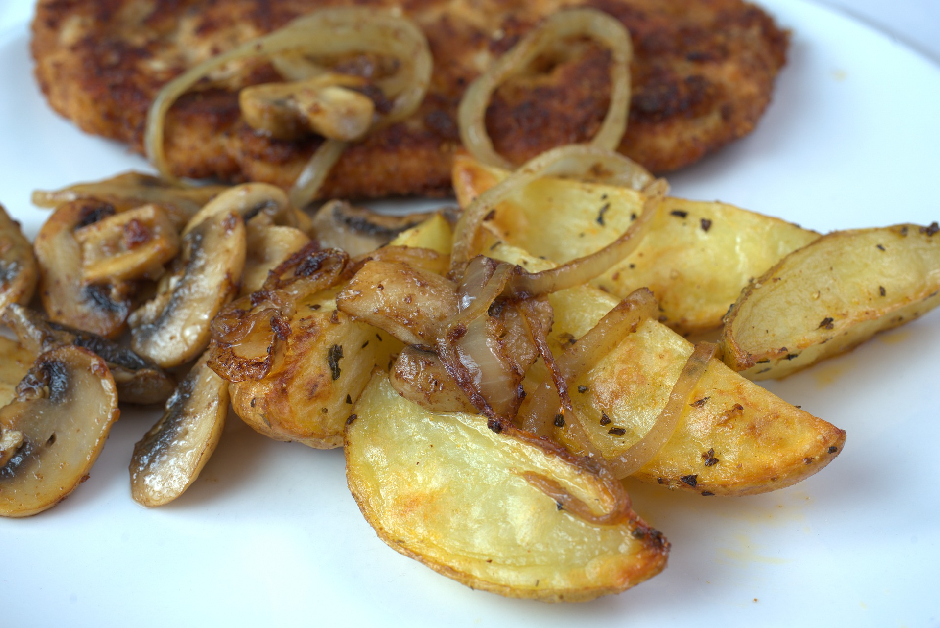 Scaloppine di maiale ai funghi al forno