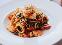 Pasta con calamari e carciofi ricetta