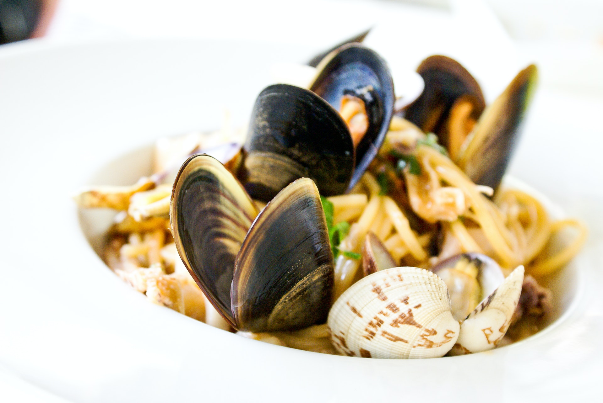 Spaghetti cacio e pepe cozze